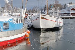 stock-photo-fishing-boats-boat-in-the-small-harbor-during-winter-time.jpg